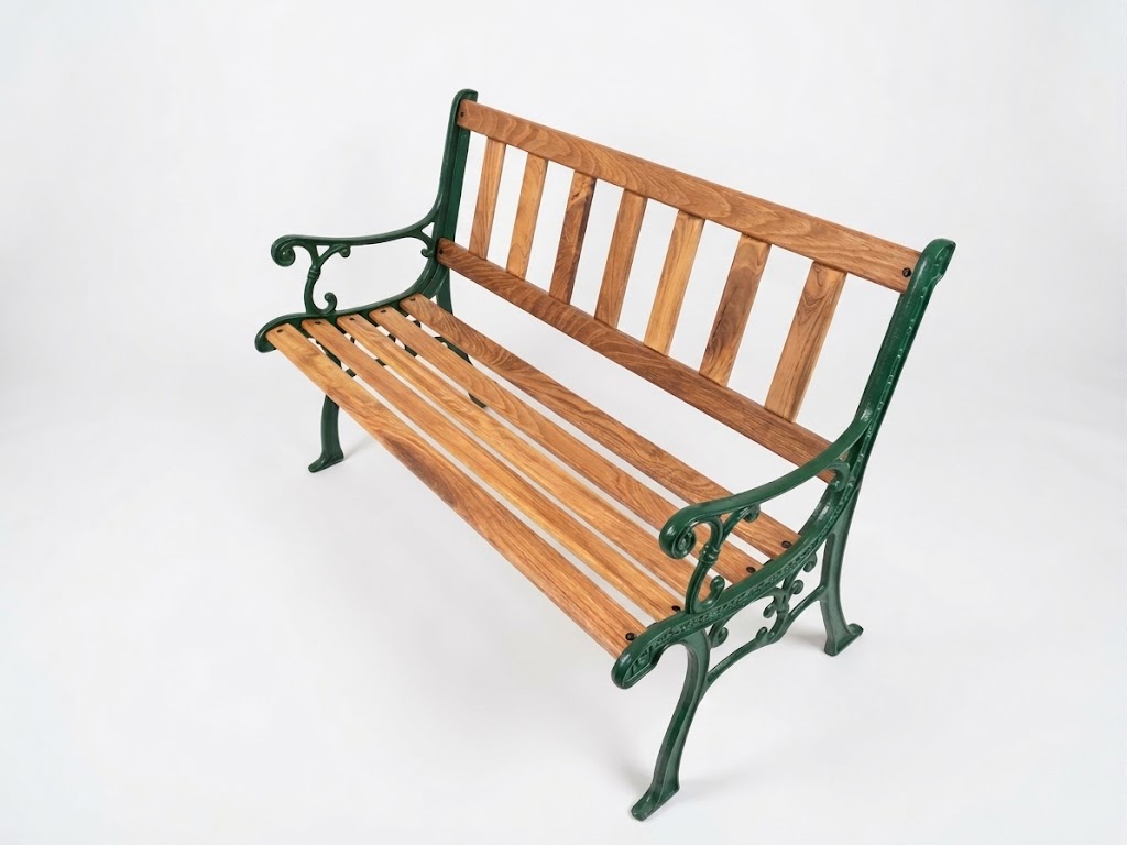 Park Bench Restoration — a park bench with new African teak slats and a refinished green cast-iron frame